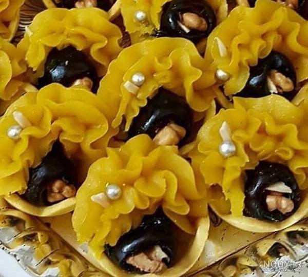 44 مدل تزیین خرما 2023 جدید به شکل گل؛ با پودر نارگیل, کنجد, خلال بادام - گلی خانوم 44 مدل تزیین خرما 2023 جدید به شکل گل؛ با پودر نارگیل, کنجد, خلال بادام - گلی خانوم