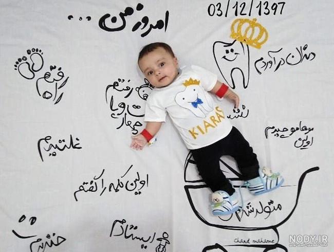 عکس های ماهگرد نوزاد پسر با تزیینات زیبا در خانه عکس های ماهگرد نوزاد پسر با تزیینات زیبا در خانه
