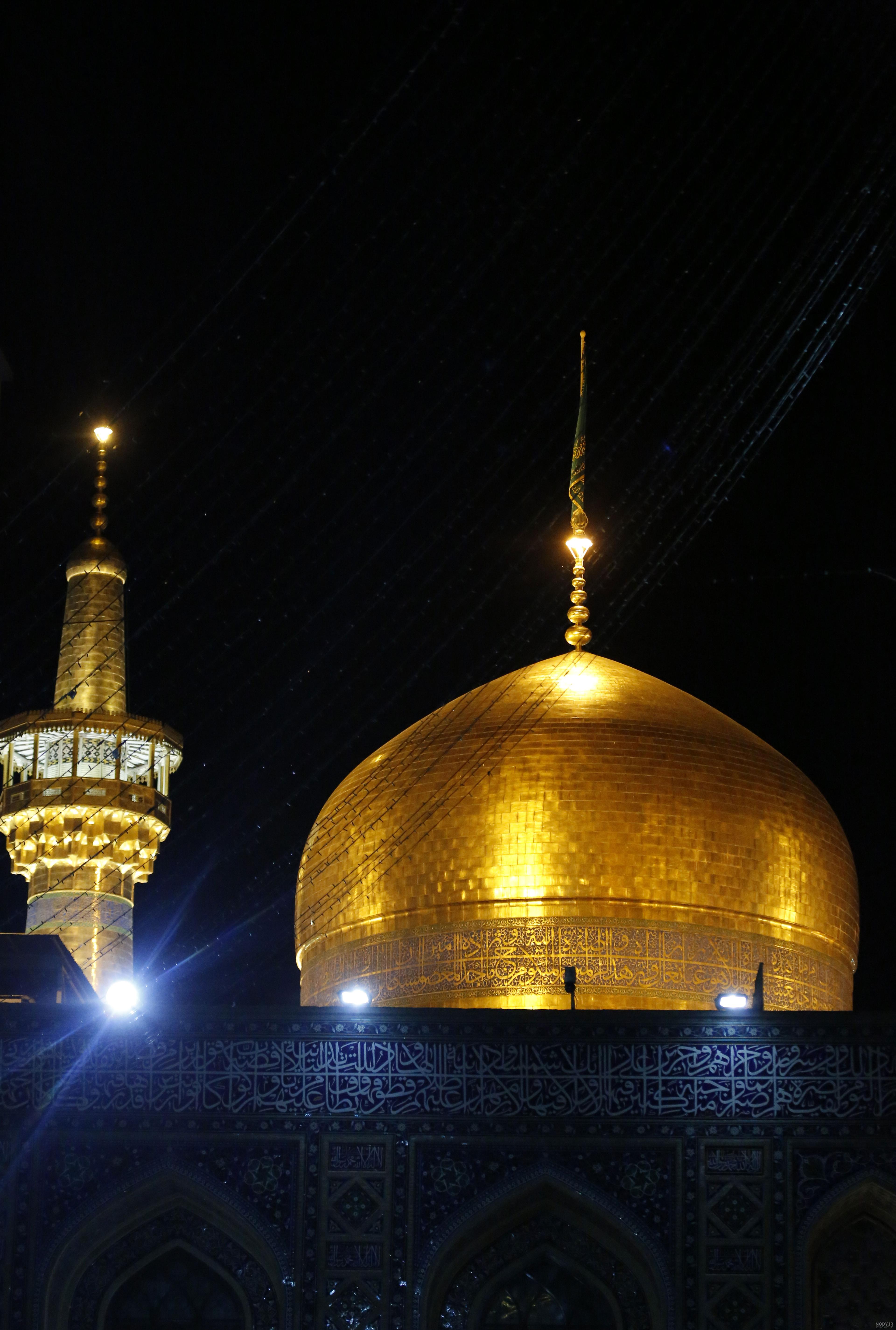 تصویر استوک گنبد و گلدسته حرم امام رضا | گرافا