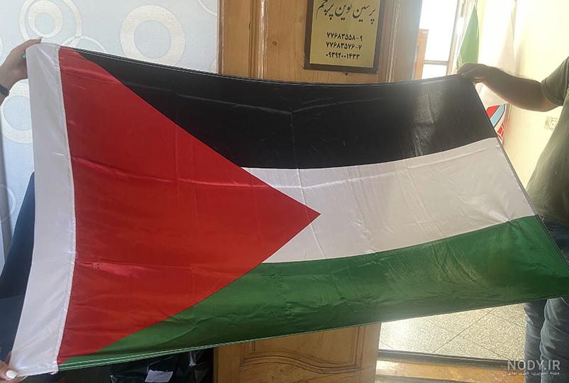فرارو | (تصاویر) تولید پرچم فلسطین و اسرائیل در خُمین
