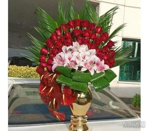 عکس دسته گل روی میز کار