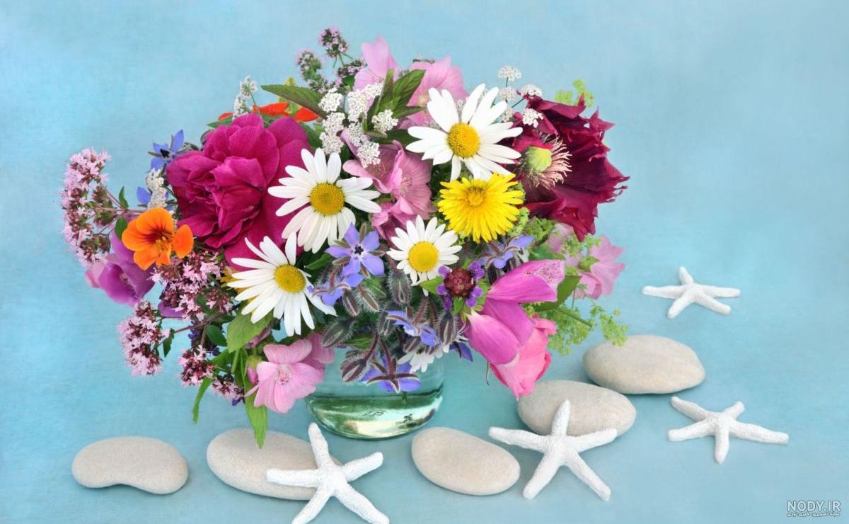مدل های خاص و زیبا از دسته گل های رنگی و جذاب مدل های خاص و زیبا از دسته گل های رنگی و جذاب
