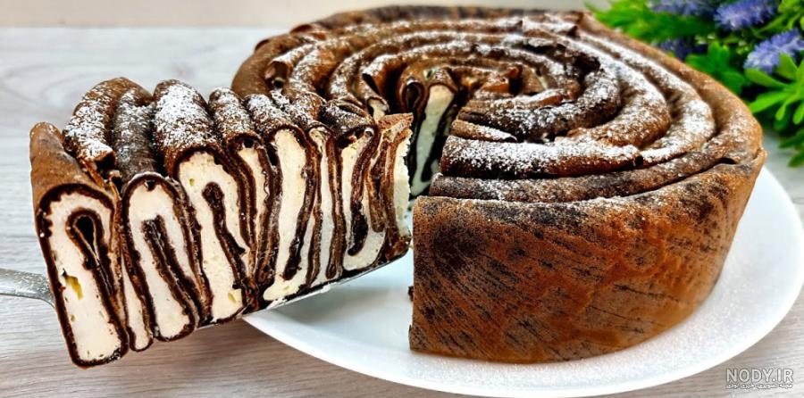 طرز تهیه کیک شکلاتی با روکش گاناش یا سس شکلاتی طرز تهیه کیک شکلاتی با روکش گاناش یا سس شکلاتی
