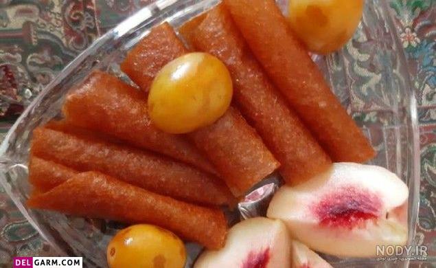 تزیین لواشک کادویی و یلدا به شکل پاپیون و گل با سیخ چوبی