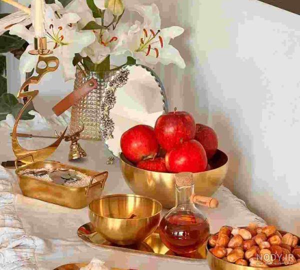 22 عکس بسیار زیبا و جدید از تزیین سفره هفت سین برای سال نو - Tjoor 22 عکس بسیار زیبا و جدید از تزیین سفره هفت سین برای سال نو - Tjoor