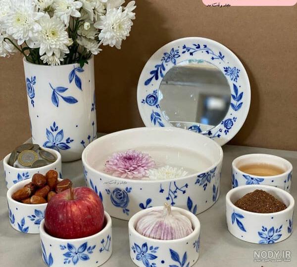 سرویس هفت سین مینا سفال پایه دار گل قرمز – گالری صنایع دستی اتراب | Atrab Handicrafts Gallery سرویس هفت سین مینا سفال پایه دار گل قرمز – گالری صنایع دستی اتراب | Atrab Handicrafts Gallery