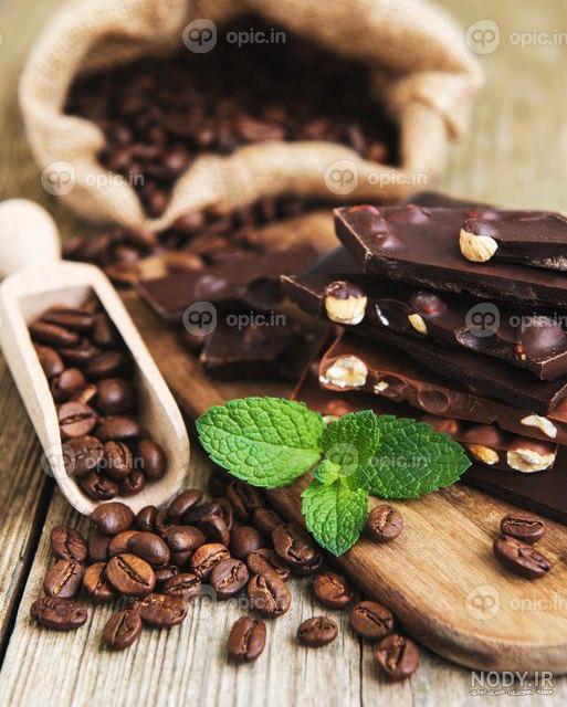 عکس تخته شکلاتی و کاکائویی و دانه ها قهوه – عکس با کیفیت و تصاویر استوک حرفه ای عکس تخته شکلاتی و کاکائویی و دانه ها قهوه – عکس با کیفیت و تصاویر استوک حرفه ای
