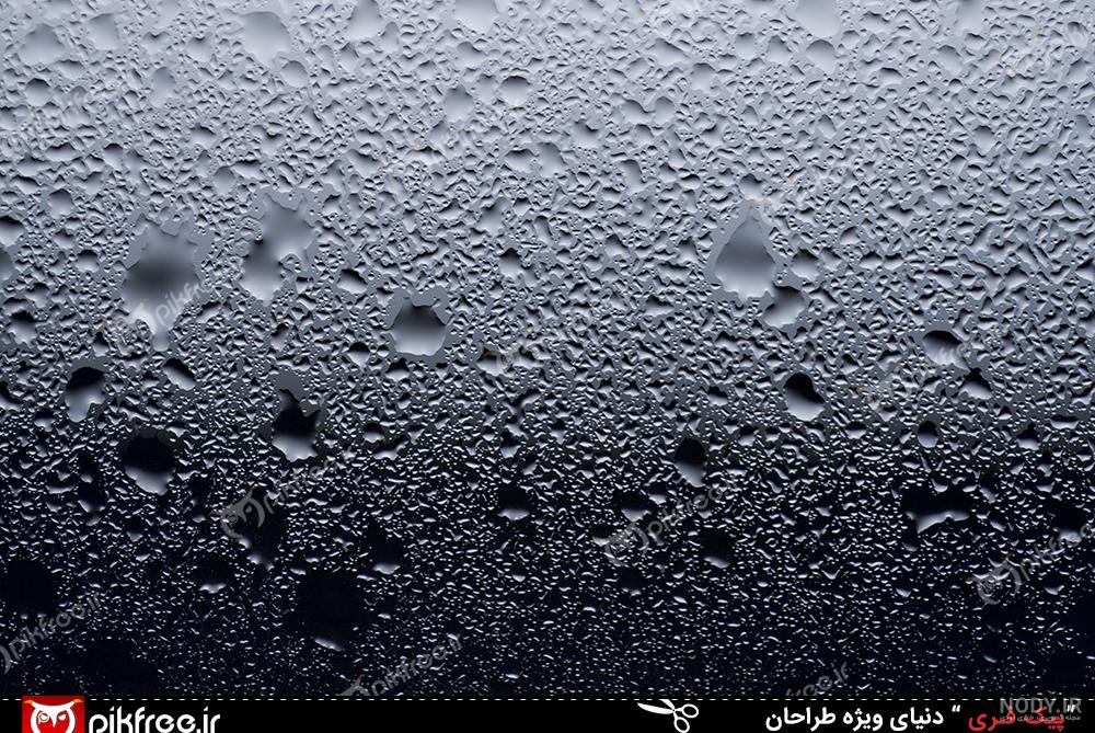 عکس زمینه نور و قطره های باران محو پشت شیشه پس زمینه | والپیپر گرام عکس زمینه نور و قطره های باران محو پشت شیشه پس زمینه | والپیپر گرام
