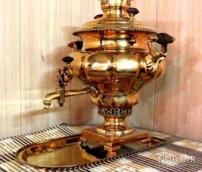 سماور چای قدیمی روسی جدا شده روی سفید 1318562 سماور چای قدیمی روسی جدا شده روی سفید 1318562