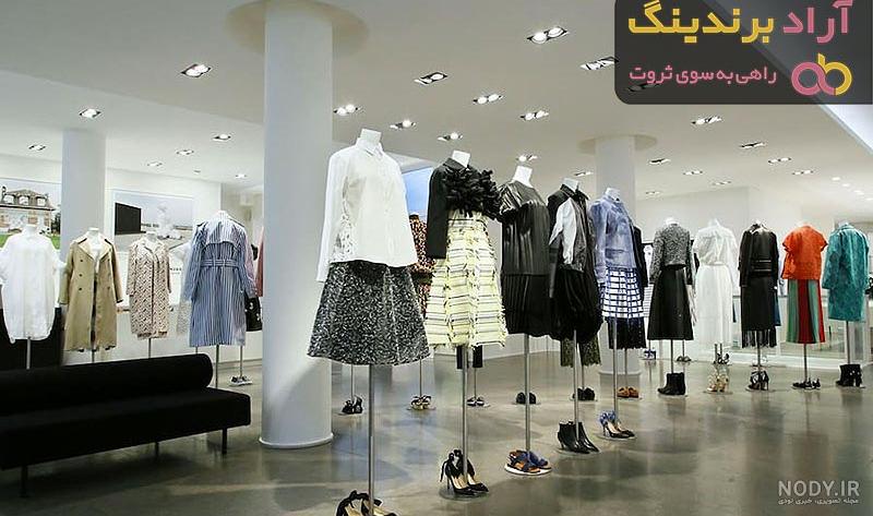 لباس مجلسی در رشت؛ کار شده قرمز طلایی بلند 2 مدل دکلته قایقی - آراد برندینگ