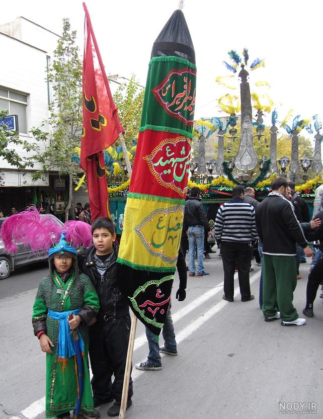 عکس / عَلَم دسته عزاداری در دست کودک ایرانی جهانی شد عکس / عَلَم دسته عزاداری در دست کودک ایرانی جهانی شد