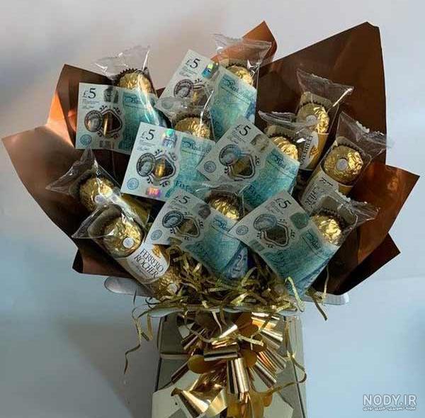 عکس با کیفیت دسته های اسکناس دو هزار تومانی عکس با کیفیت دسته های اسکناس دو هزار تومانی