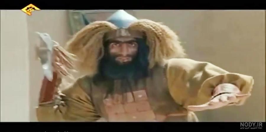 عکس) انوش معظمی بازیگر نقش حرمله و لحظه پرتاب تیر به گلوی حضرت علی اصغر