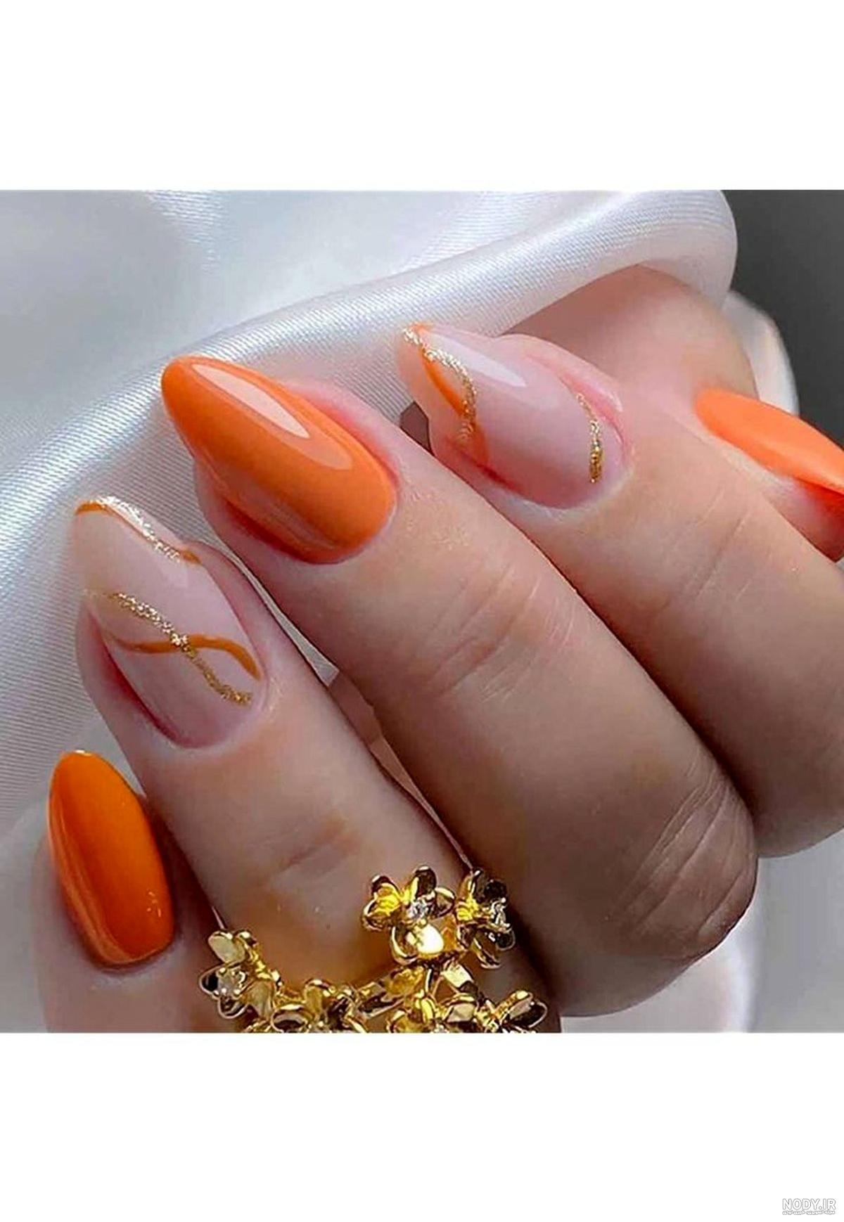 طراحی ناخن نارنجی برای داشتن مانیکور جذاب در بهار و تابستان طراحی ناخن نارنجی برای داشتن مانیکور جذاب در بهار و تابستان