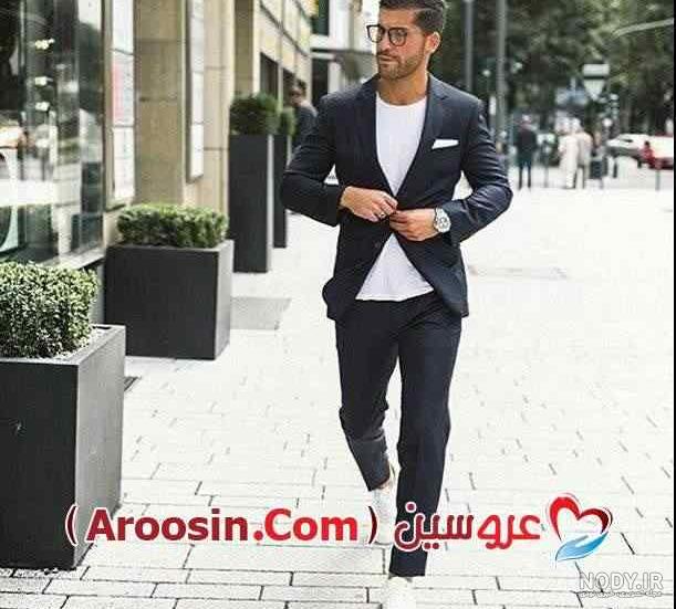 رواج یک مرد جوان خوش تیپ با کت و شلوار کلاسیک زیبا زیبایی مردانه مد 1291573 رواج یک مرد جوان خوش تیپ با کت و شلوار کلاسیک زیبا زیبایی مردانه مد 1291573