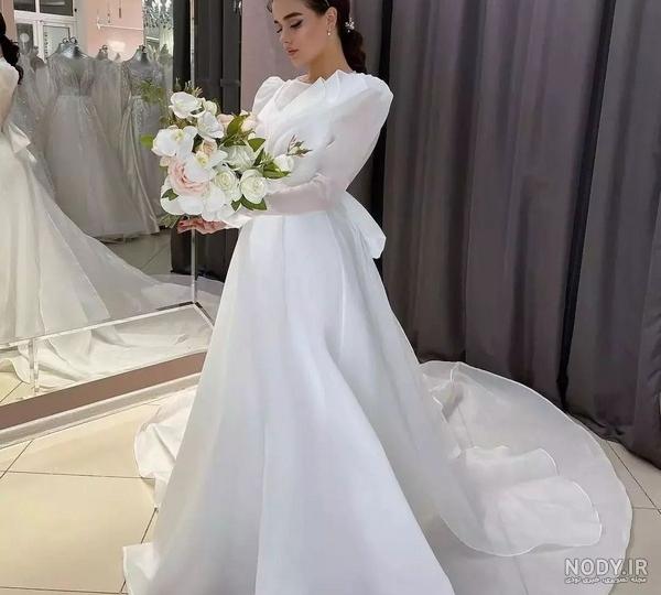 عکس لباس عروس با تور بلند عکس لباس عروس با تور بلند