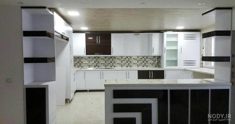 کابینت سفید آشپزخانه با صفحه مشکی - فن و هنر کابینت سفید آشپزخانه با صفحه مشکی - فن و هنر