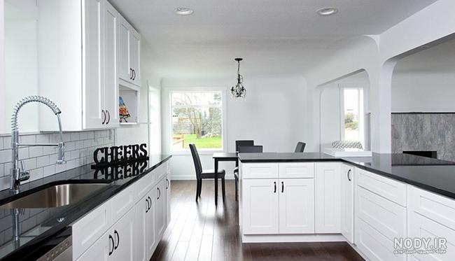 کابینت نئوکلاسیک سفید با صفحه مشکی 2024 - نوین کابین کابینت نئوکلاسیک سفید با صفحه مشکی 2024 - نوین کابین
