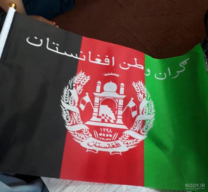 عکس شیر با بیرق افغانستان
