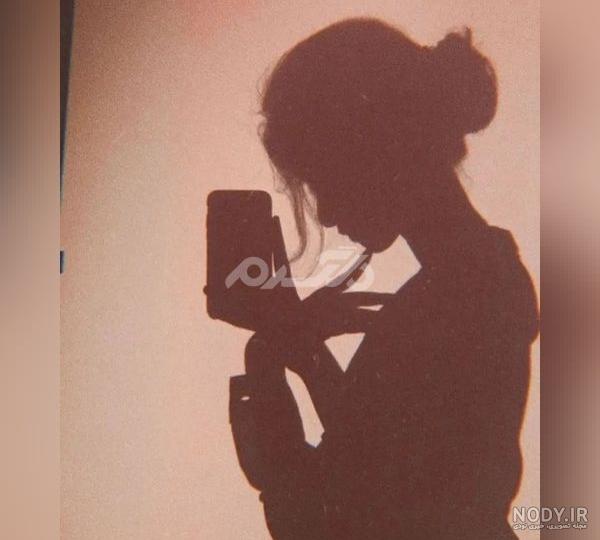 عکس سایه دختر در تاریکی