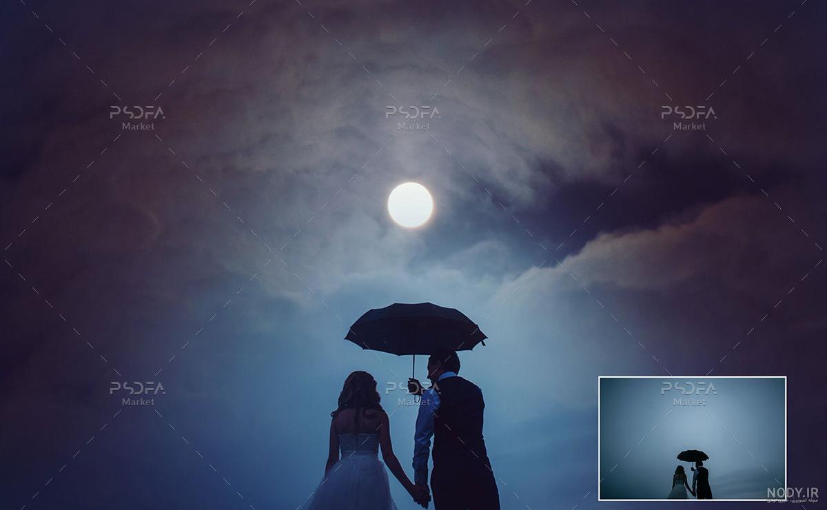 دانلود عکس دو کهکشان در پس زمینه شب پر ستاره | اوپیک