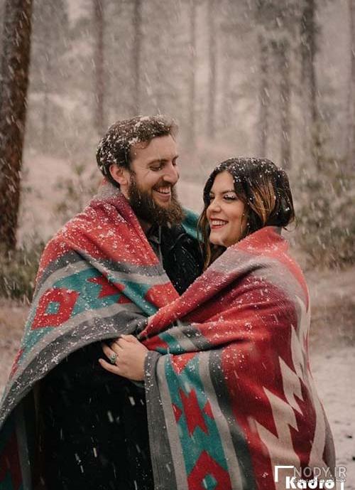 عکس عاشقانه دونفره زیر برف