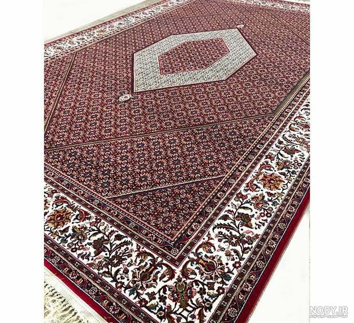 فرش ماشینی کشمیر طرح ریز ماهی جهان سرمه ای فرش ماشینی کشمیر طرح ریز ماهی جهان سرمه ای