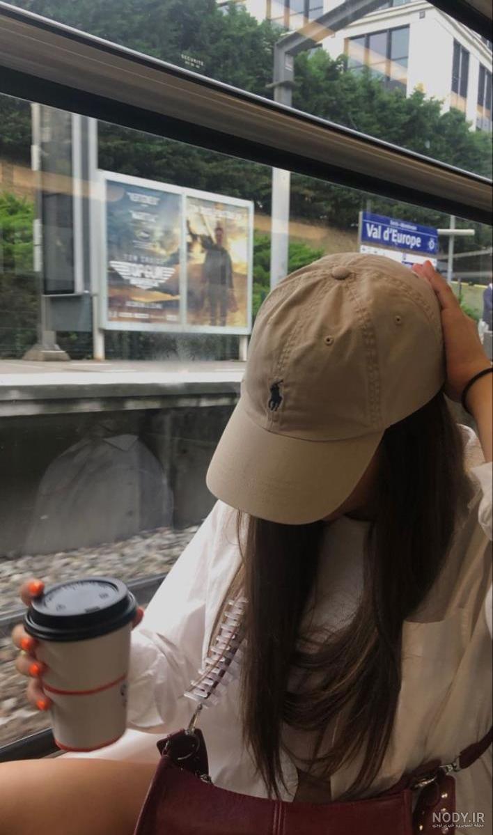 عکس دختر از پشت سر با موهای باز مشکی