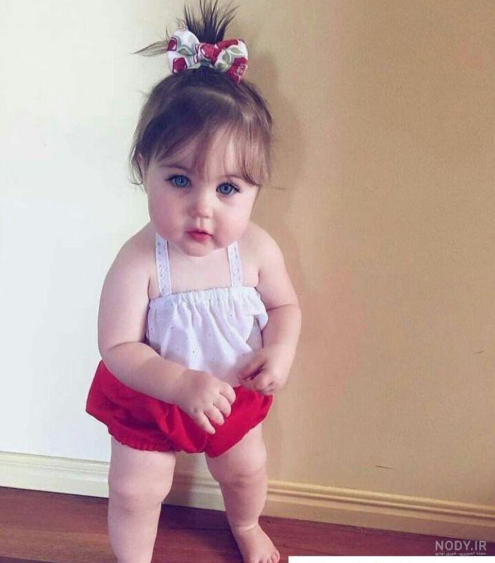 تصویر با کیفیت پرتره دختر بچه ده ماهه زیبا