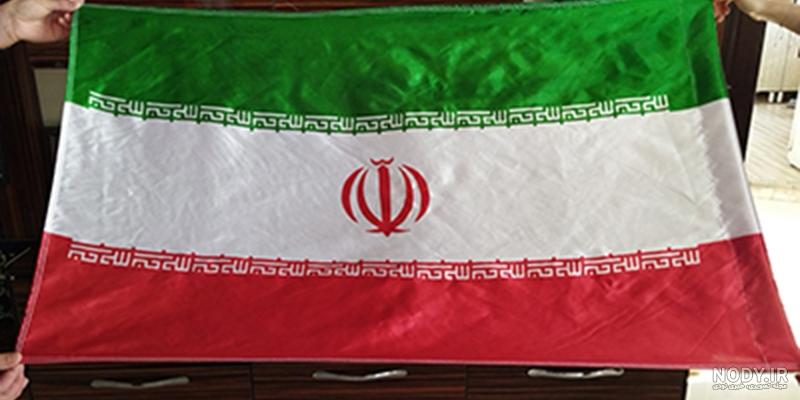 اهتزاز پرچم های ایران، سوریه و روسیه در خیابان‌های دمشق +عکس
