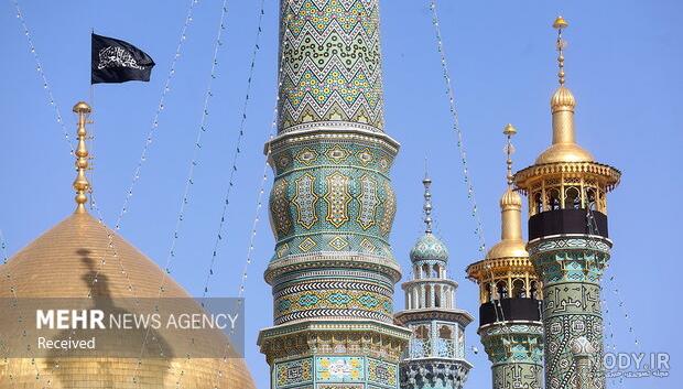 تصاویر ا تعویض پرچم گنبد حرم حضرت معصومه (س) - همشهری آنلاین