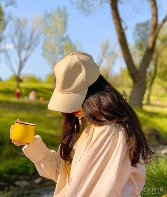 عکس دختر با کلاه سبز