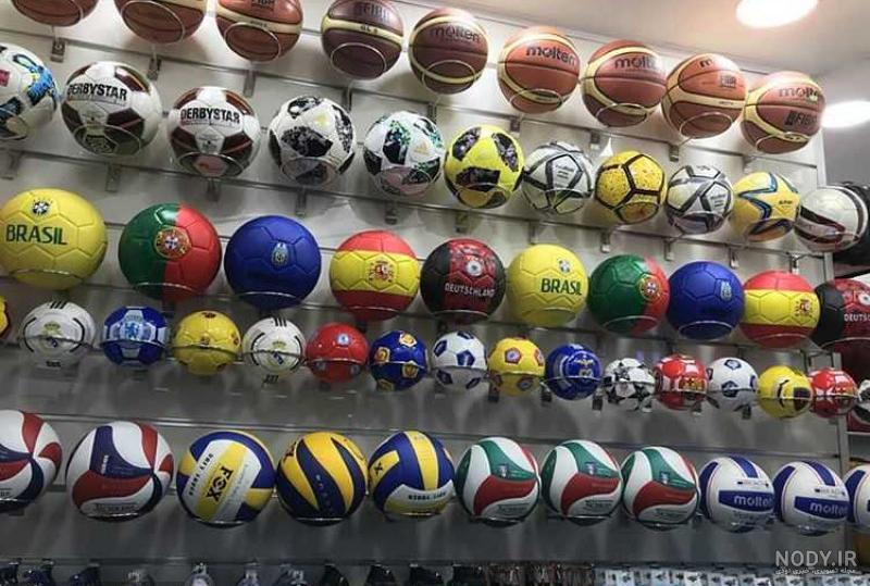 عکس با کیفیت انواع توپ های ورزشی مختلف در کنار یکدیگر در پس زمینه سفید - عکس  با کیفیت و تصاویر استوک حرفه ای