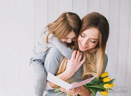 عکس دختر در بغل مادر عکس دختر در بغل مادر