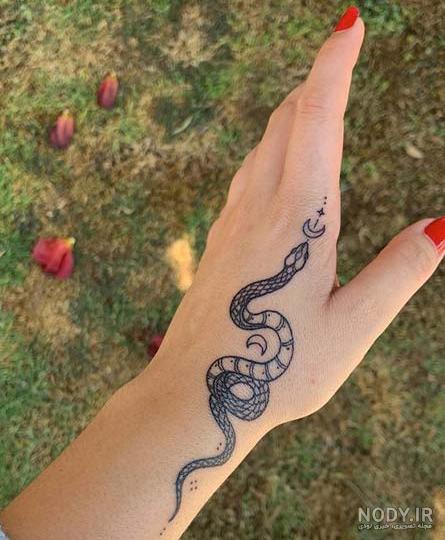28 عکس تاتو گل روی دست برای زیباترین طراحی ها