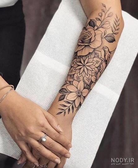 تاتو روی دست دختر فیک