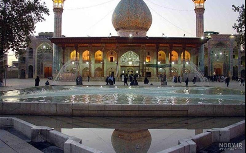 مشرق نیوز - عکس/ آیین تعویض پرچم گنبد حرم شاهچراغ(ع)‎‎
