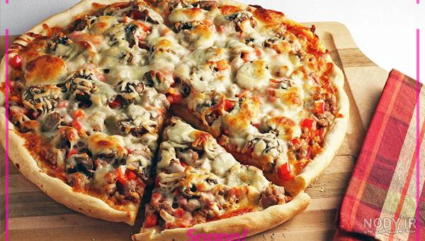 طرز تهیه پیتزا خانگی در توستر با طعم خوشمزه فست فودی طرز تهیه پیتزا خانگی در توستر با طعم خوشمزه فست فودی