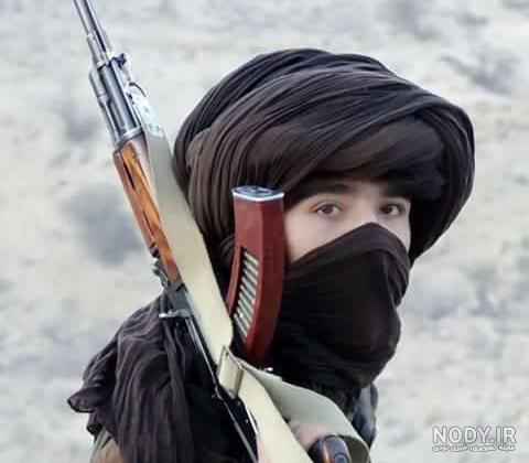 عکس زن بلوچ با تفنگ عکس زن بلوچ با تفنگ